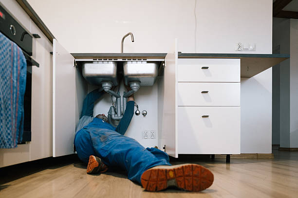 Professional Drain Cleaning technician working in Seneca, MO